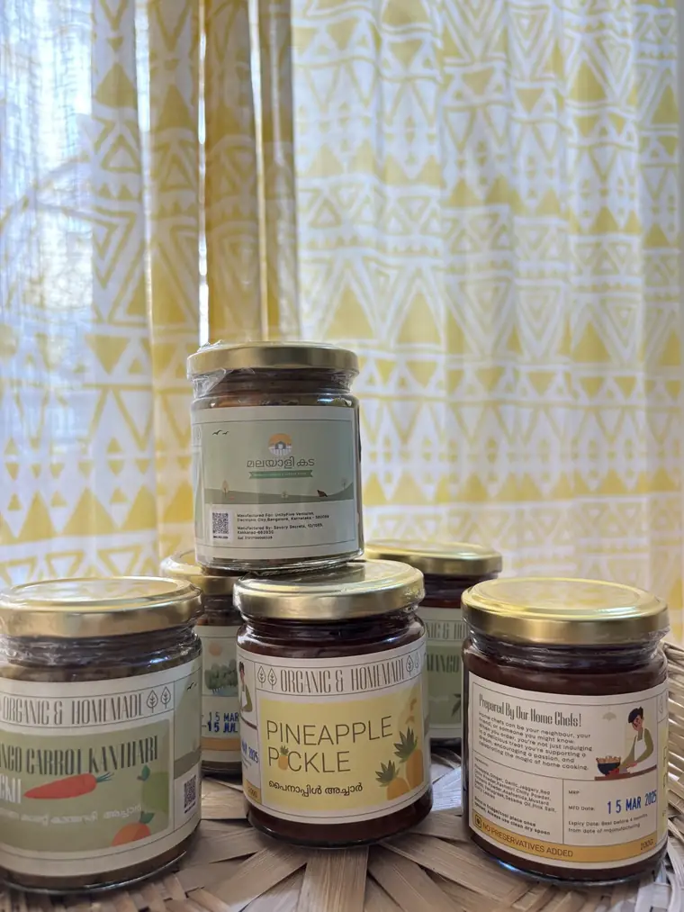 Row of labelled jars on a stall table