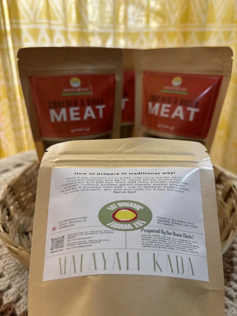Back of a meat pouch showing the Malayali Kada stamp label