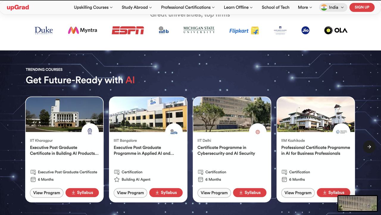Trending courses section on a dark navy background with four university programme cards