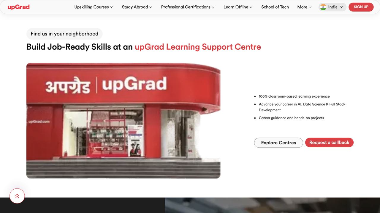 Learning support centre section showing an upGrad storefront photograph beside a bulleted list and two buttons
